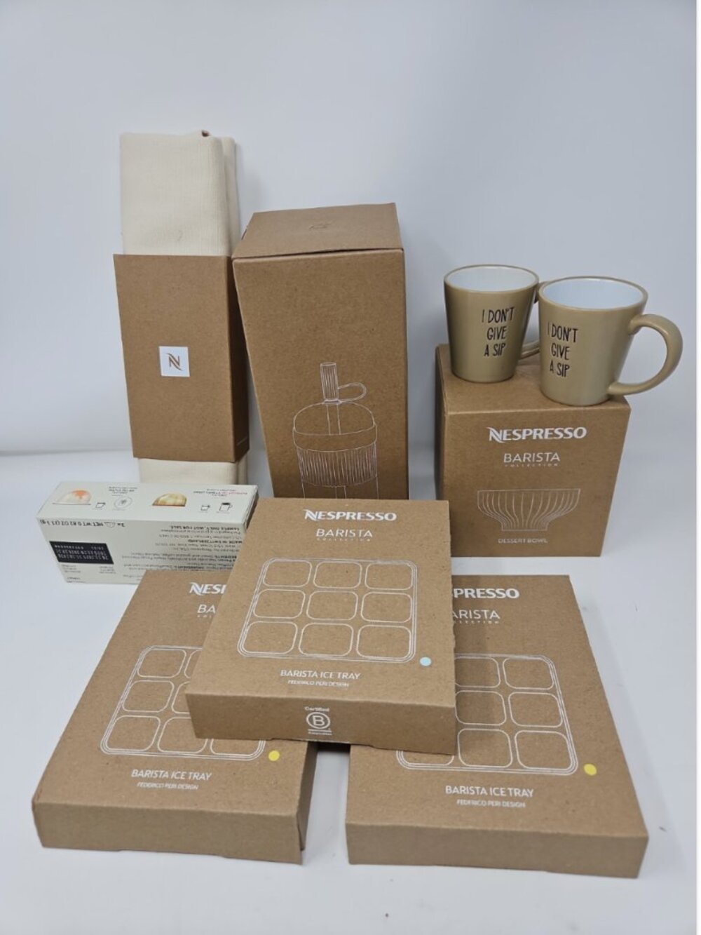 NIB 9pc Nespresso Coffee Accessories Ice Cube Trays Tote Pods Travel Mug Dessert